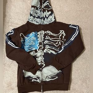 Brown hoodie with skeleton design